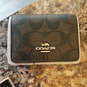 Coach White Retail Barcode Tag with Black Print